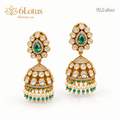1002 green jhumka earrings on a white background