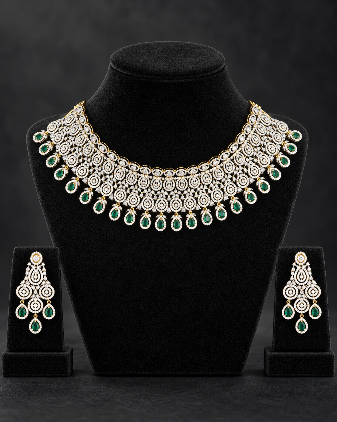 Emerald Teardrop Cascade 92.5 Silver Necklace Set on a display stand