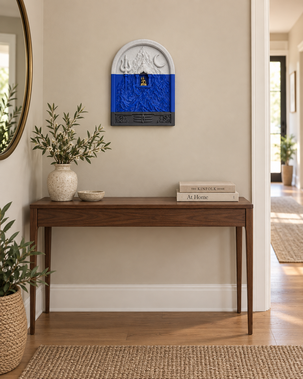 Kailasha wall art displayed above an entryway console